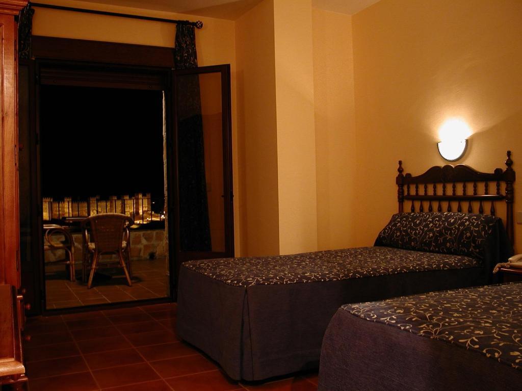 Hotel Restaurante Baños Baños de la Encina Habitación foto